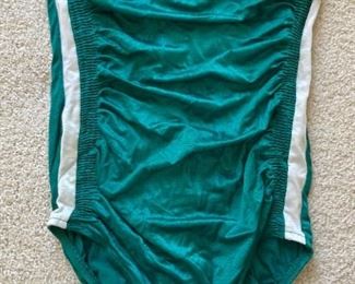 Vintage clothes including bathing suits, shorts, t-shirts, shirts, sweaters, pants, dresses and more