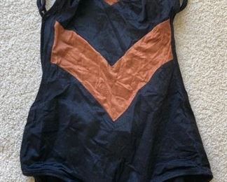Vintage clothes including bathing suits, shorts, t-shirts, shirts, sweaters, pants, dresses and more