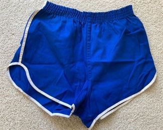 Vintage clothes including bathing suits, shorts, t-shirts, shirts, sweaters, pants, dresses and more