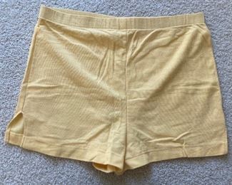 Vintage clothes including bathing suits, shorts, t-shirts, shirts, sweaters, pants, dresses and more