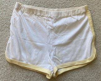 Vintage clothes including bathing suits, shorts, t-shirts, shirts, sweaters, pants, dresses and more