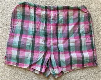 Vintage clothes including bathing suits, shorts, t-shirts, shirts, sweaters, pants, dresses and more