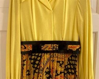 Vintage clothes including bathing suits, shorts, t-shirts, shirts, sweaters, pants, dresses and more