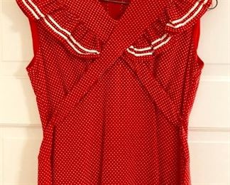 Vintage clothes including bathing suits, shorts, t-shirts, shirts, sweaters, pants, dresses and more