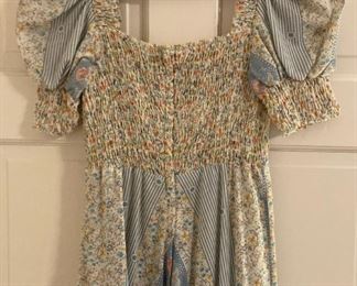Vintage clothes including bathing suits, shorts, t-shirts, shirts, sweaters, pants, dresses and more