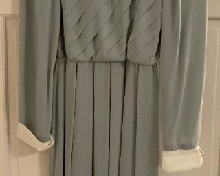 Vintage clothes including bathing suits, shorts, t-shirts, shirts, sweaters, pants, dresses and more