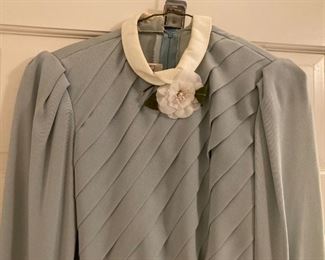 Vintage clothes including bathing suits, shorts, t-shirts, shirts, sweaters, pants, dresses and more