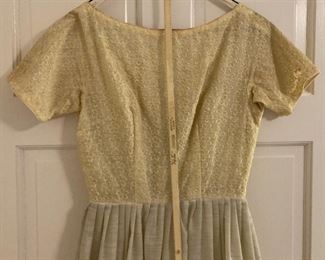 Vintage clothes including bathing suits, shorts, t-shirts, shirts, sweaters, pants, dresses and more