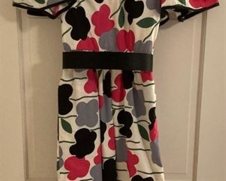 Vintage clothes including bathing suits, shorts, t-shirts, shirts, sweaters, pants, dresses and more