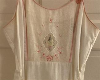 Vintage clothes including bathing suits, shorts, t-shirts, shirts, sweaters, pants, dresses and more