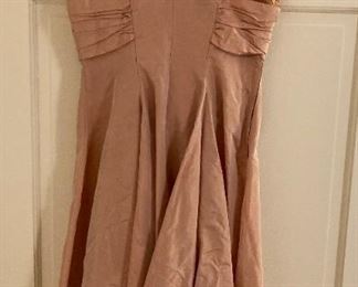 Vintage clothes including bathing suits, shorts, t-shirts, shirts, sweaters, pants, dresses and more