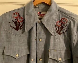 Vintage clothes including bathing suits, shorts, t-shirts, shirts, sweaters, pants, dresses and more