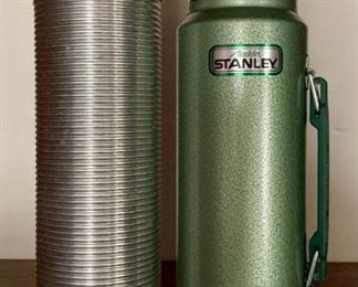 Various vintage thermoses including Stanley