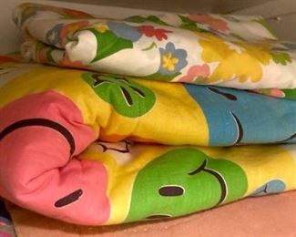 Vintage sleeping bag and twin bedspread