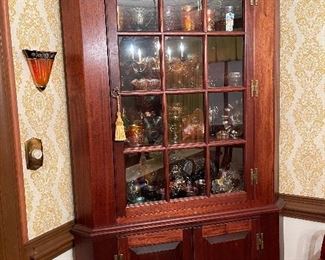 12 Pane solid mahogany corner cabinet, small part of an extensive collection of carnival glass.