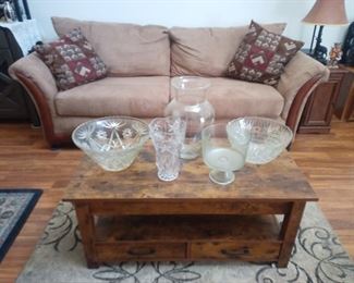 Sofa, coffee table and glassware
