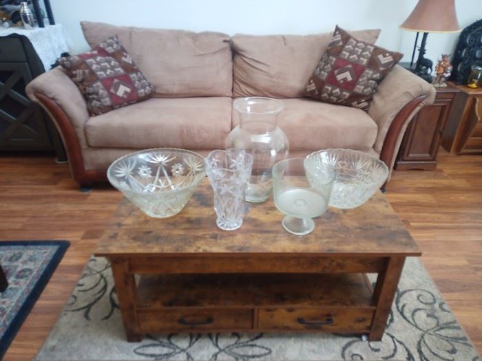 Sofa, coffee table and glassware