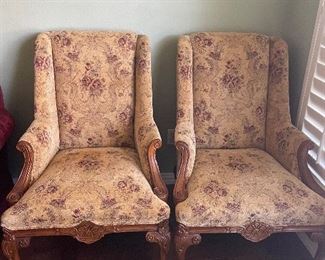 Upholstered side chairs with wood carved legs and arms