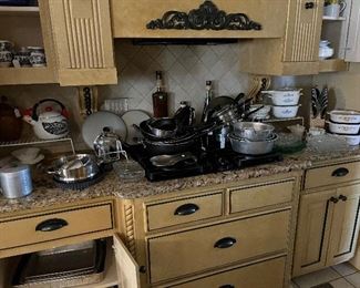 Lots of cookware, vintage Corning and Tupperware 