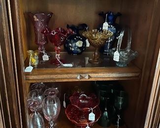Collectibles in Apsen Home lighted hutch 