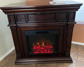 Flameless fireplace. Even generates heat.