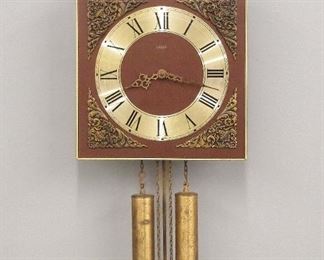 A late 20th century Linden novelty wall clock.  8-day weight driven movement with arched wooden dial with Brass spandrels and chapter ring, Roman numerals and upper "Blacksmith" automaton.  Slight wear, running when cataloged.  18" high plus weight drop.  ESTIMATE $50-75
