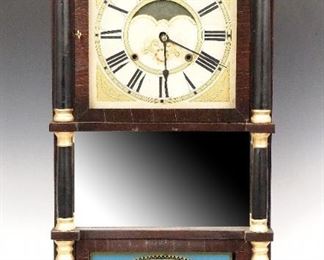 A 19th century Birge & Gilbert Triple Decker shelf clock.  8-day weight driven Strap Brass time and strike movement with painted wooden dial with Roman numerals.  Mahogany case with a shaped crest and molded crown over a dial door with clear dial glass, mirrored center panel, turned gilded and painted columns, lower door with reverse painted glass on a plinth base.  Paper label 50% intact.  Older refinishing with minor damage, restored crest and gilding, replaced Tom Moberg lower glass, running momentarily when cataloged.  37 1/4" high.  ESTIMATE $100-200
