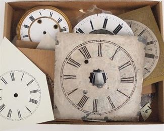 A collection of vintage clock dials.  Approx. eight clock dials and parts, mostly porcelain.  Some with significant damage, As/Found.  Up to 7 3/4" diameter.  ESTIMATE $20-30
