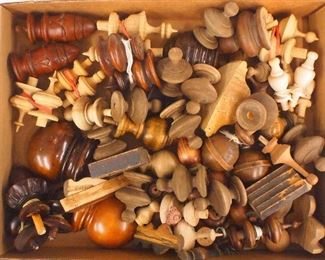 A collection of wooden clock finials.  Approx. twenty pieces total, of various ages and sizes.  As/Found.  ESTIMATE $20-30

