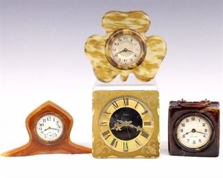 Four small 20th century clocks including two novelty Celluloid clocks, a Bakelite tambour clock and a Seth Thomas desk clock.  Some with damage and cracks, not tested, sold as-is.  Up to 4 3/4" high.  ESTIMATE $100-200
