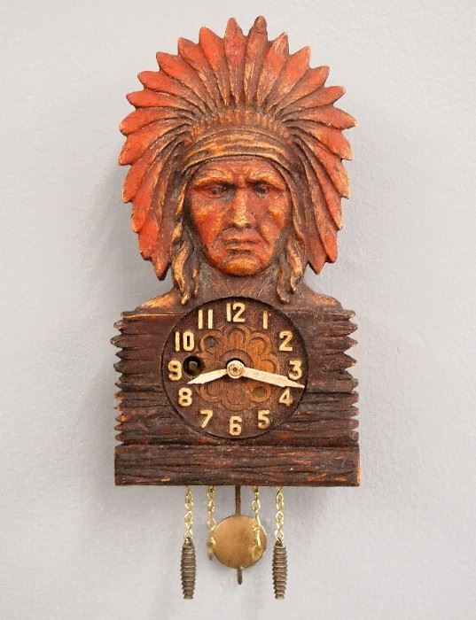 An early 20th century Lux/Keebler novelty clock.  30-hour time only movement in a composition case with a Native American Chief design.  Original finish with some wear, running when cataloged.  8 1/2" high overall.  ESTIMATE $100-150