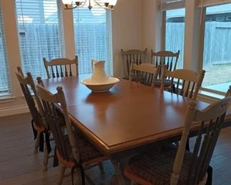 Farmhouse style table with eight chairs