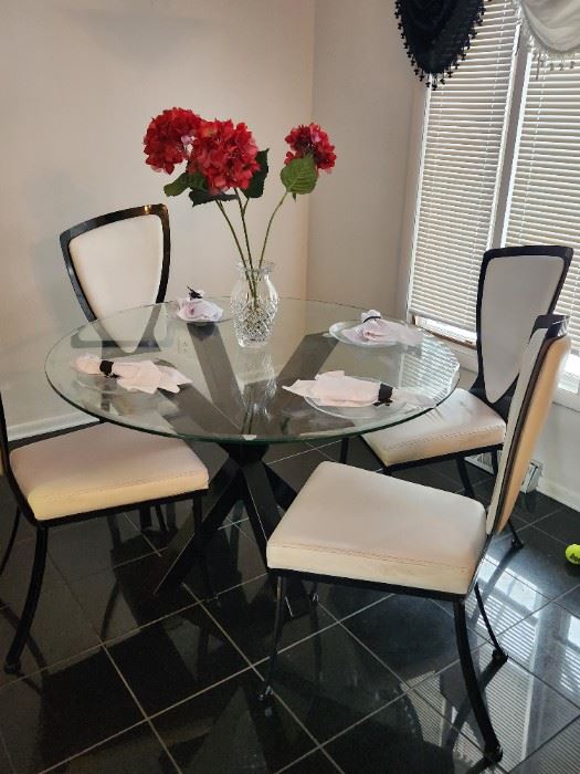 High end contemporary glass and metal table