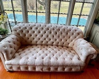 Small Leather Chesterfield Settee.  