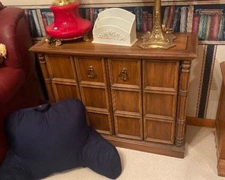 Narrow cabinet and brass dual headed lamp  set cool red hurricane style lamp, back rest pillow 