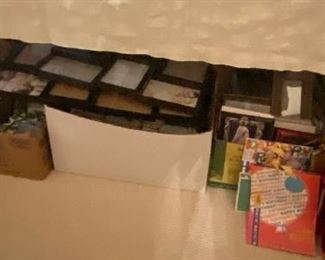 multiple boxes of picture frames 