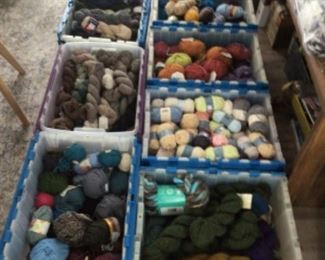 Bunches of brand new skeins of yarn.
