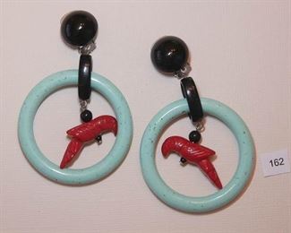 Attributed to Angela Caputi. Unique Parrots!