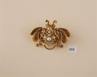 Barrera Brooch in a stylized Bee form. Oval cabochon faux pearl, half pearl, clear and gold faceted stones, 2 seed pearls.