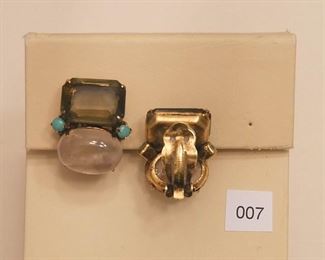 Iradj Moini gold Tone earrings each has one oval cabochon rose quartz stone and one emerald cut smoky topaz and two round cabochon turquoise.