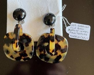 Angela Caputi Drop earrings measuring approx. 3” in length. The top portion has a round black button back and the squarish drop has a center hole.