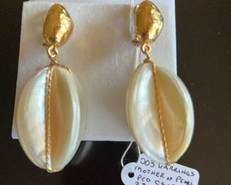 Goosens Paris Sterling and gold wash Mother-of- pearl drop earrings with yellow twist wire measuring approx. 2 3/4” in length.