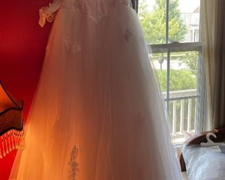 New with tags— never worn wedding dress