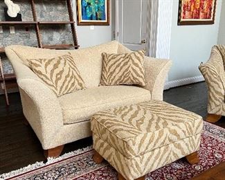 American Signature cream loveseat (72"W x 42"D x 40"H) with zebra pattern ottoman and accent pillows 