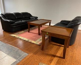 Leather sofa & loveseat. American Signature rectangular coffee table & end table