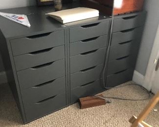 3 sets of drawer bases in gray with storage box shown on top 
