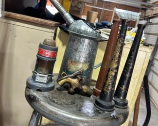 Antique fire nozzles and oil cans