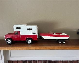 Vintage Tonka truck with camper and boat