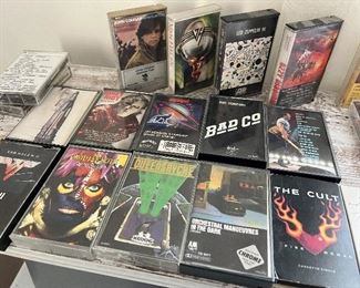 Vintage rock cassette tapes include Quiet Riot, beastie boys, David Lee Roth, The Cult, Badlands, ZZ Top, run, DMC, Skid Row, Judas Priest, Deep Purple, LL Cool J, Elton John, Ted Nugent, and more
