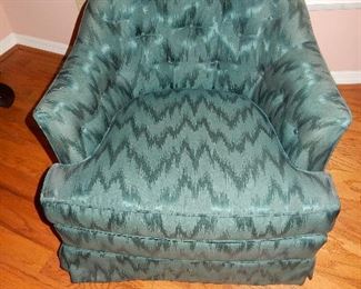 upholstered green arm chair